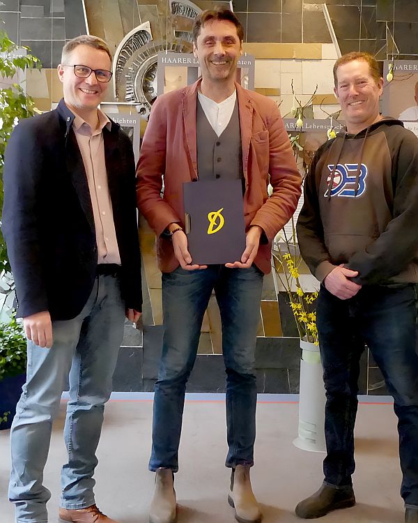 Gruppenfoto mit Ralf Stegen, Rainer Mendel und Kirk McNabb